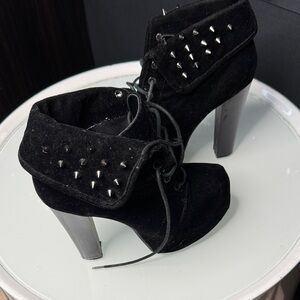 Elegant Black Heeled Boots with Stud Accents